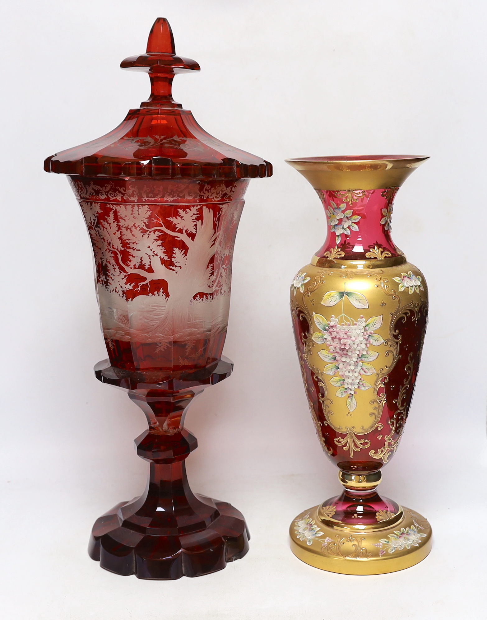A late 19th century Bohemian ruby flashed and wheel engraved glass vase and cover, 52cm high and a Venetian enamelled glass vase